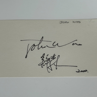 John Woo signed card
