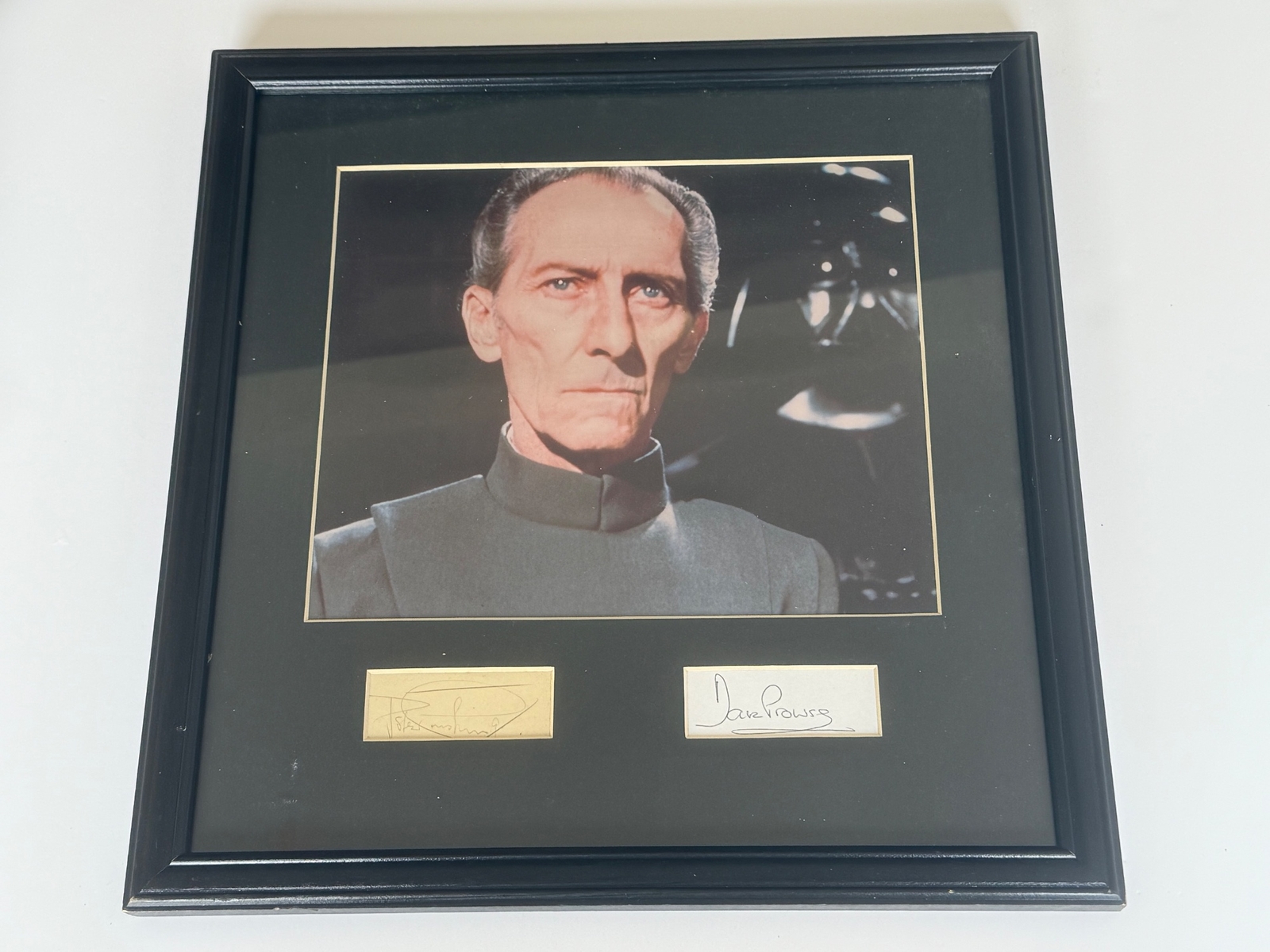 Mounted Presentation with Star Wars photograph and mounted signatures of Peter Cushing and Dave Prowse