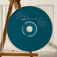 Celine Dion - A New Day Has Come CD. Signed by Celine Dion. Water Damaged
