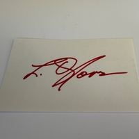 L Q Jones signed card