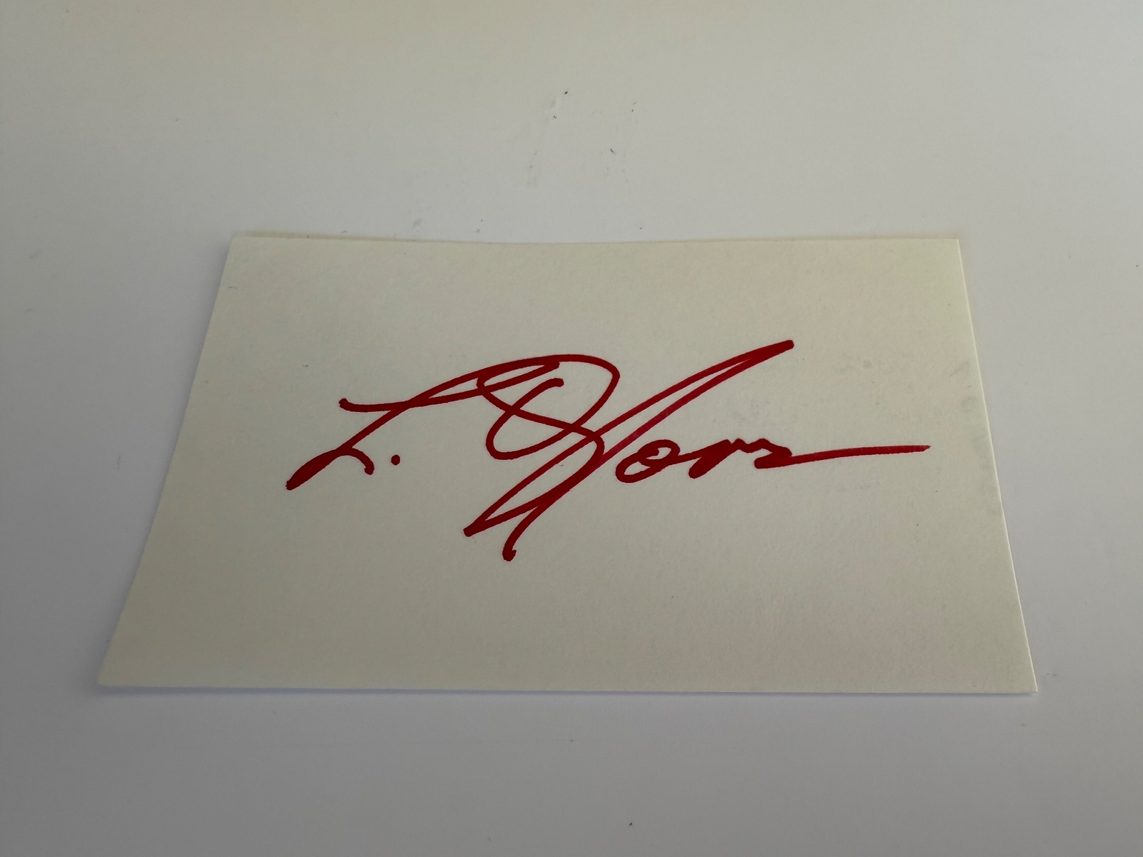 L Q Jones signed card