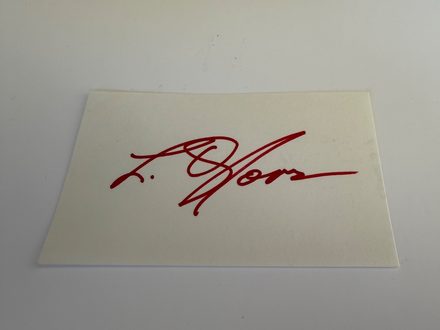 L Q Jones signed card