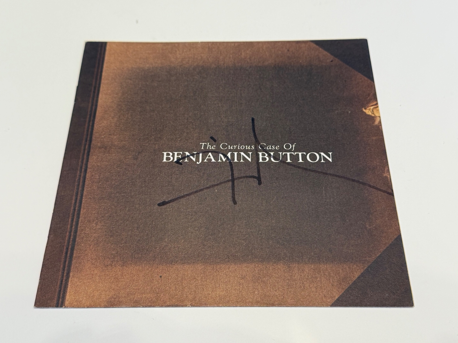 The Curious Case of Benjamin Button - signed by David Fincher.