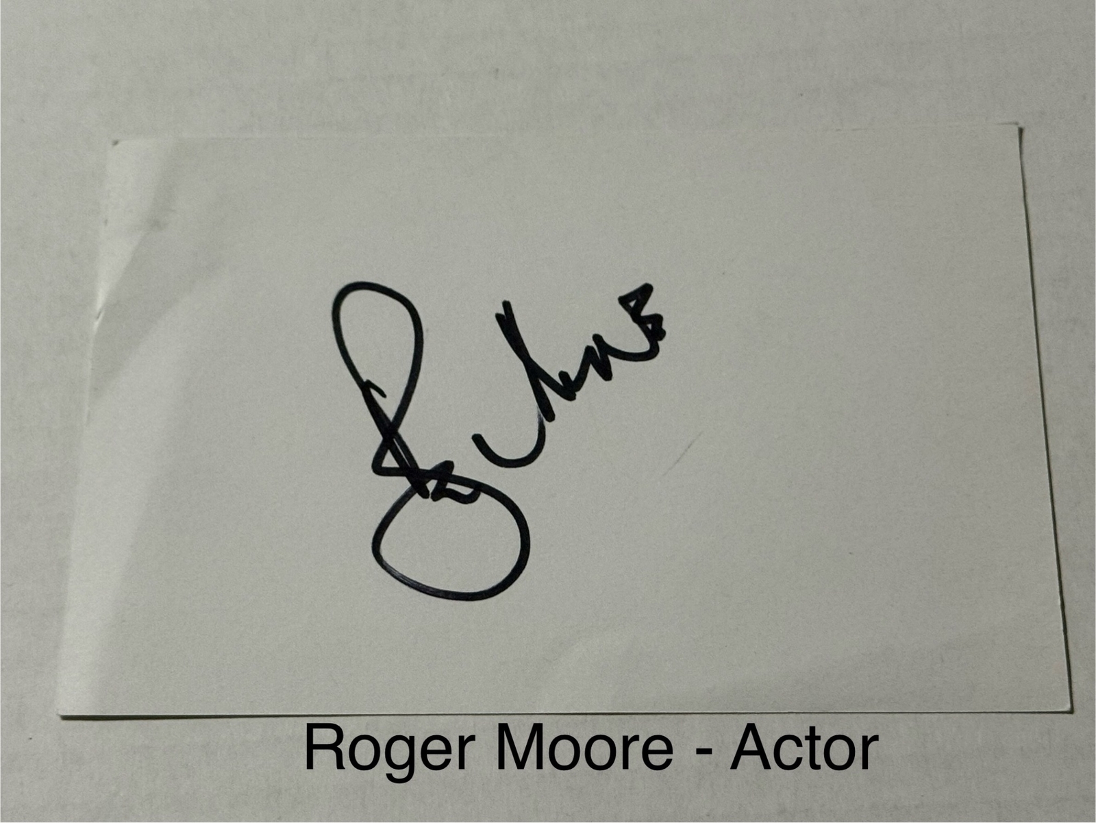 Roger Moore signed signed card
