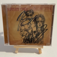 Motley Crue - Greatest Hits Cd, signed by Mick Mars, Nikki Sixx, Tommy Lee and Vince Neil