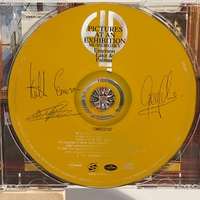 Emerson Lake and Palmer - Pictures at an exhibition. Front cover signed by Keith Emerson and Carl Palmer. CD signed by Keith Emerson, Greg Lake and Carl Palmer