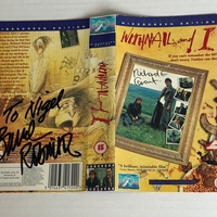 Withnail and I VHS cover signed by Bruce Robinson (Writer/Director) and Richard E Grant. Dedicated to Nigel.