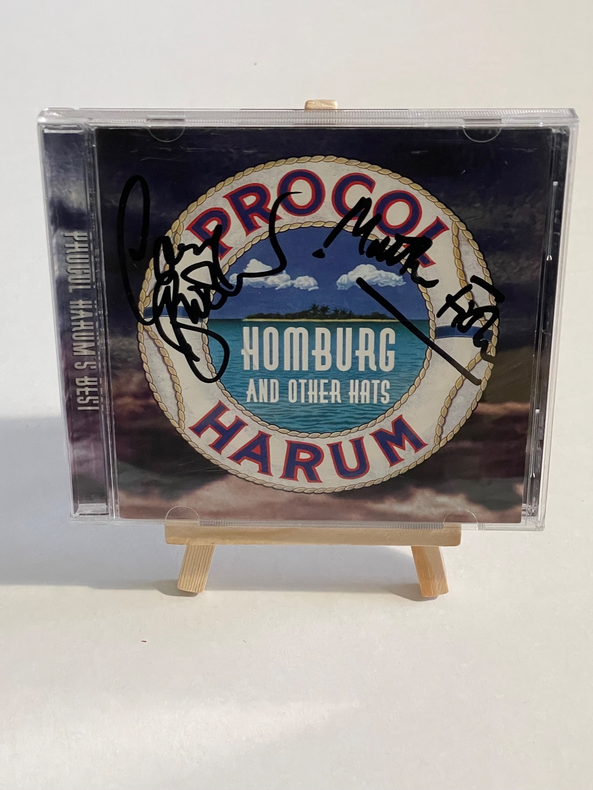 Procol Harum - Homburg and other hats. Signed by Matthew Fisher,Gary Brooker on front. On rear of booklet Matt Pegg, Mick Graham and Chris Copping. On back Alan Cartwright, Dave Bronze, David Knights?