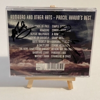 Procol Harum - Homburg and other hats. Signed by Matthew Fisher,Gary Brooker on front. On rear of booklet Matt Pegg, Mick Graham and Chris Copping. On back Alan Cartwright, Dave Bronze, David Knights?