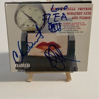 Red Hot Chilli Peppers - Greatest Hits and videos. Signed by Flea, Chad Smith, John Frusciante