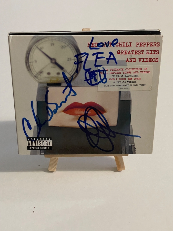 Red Hot Chilli Peppers - Greatest Hits and videos. Signed by Flea, Chad Smith, John Frusciante