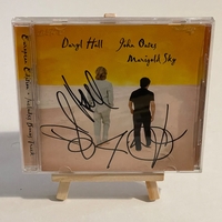 Daryl Hall and John Oates. Marigold Sky. Signed by Daryl Hall and John Oates