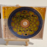 Daryl Hall and John Oates. Marigold Sky. Signed by Daryl Hall and John Oates