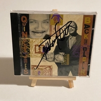 Quincy Jones - Back On The Black Cd. Signed by Quincy Jones and Phil Collins on rear of cd booklet