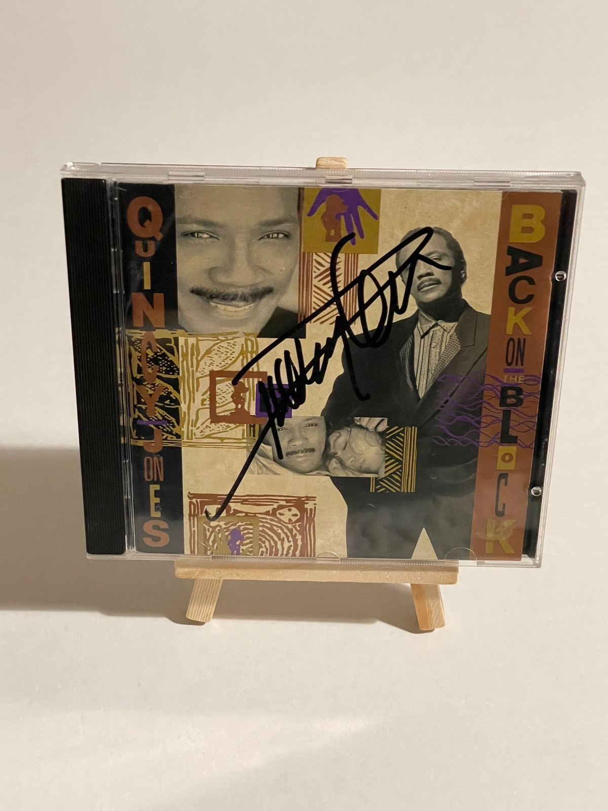 Quincy Jones - Back On The Black Cd. Signed by Quincy Jones and Phil Collins on rear of cd booklet