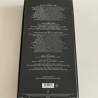 The Doors Box set. Signed on booklet by Ray Manzarek. Signed on rear of “The future ain’t what it used to be” cd by Ray Manzarek and also to rear of another cd by Ray Manzarek (Smudged)