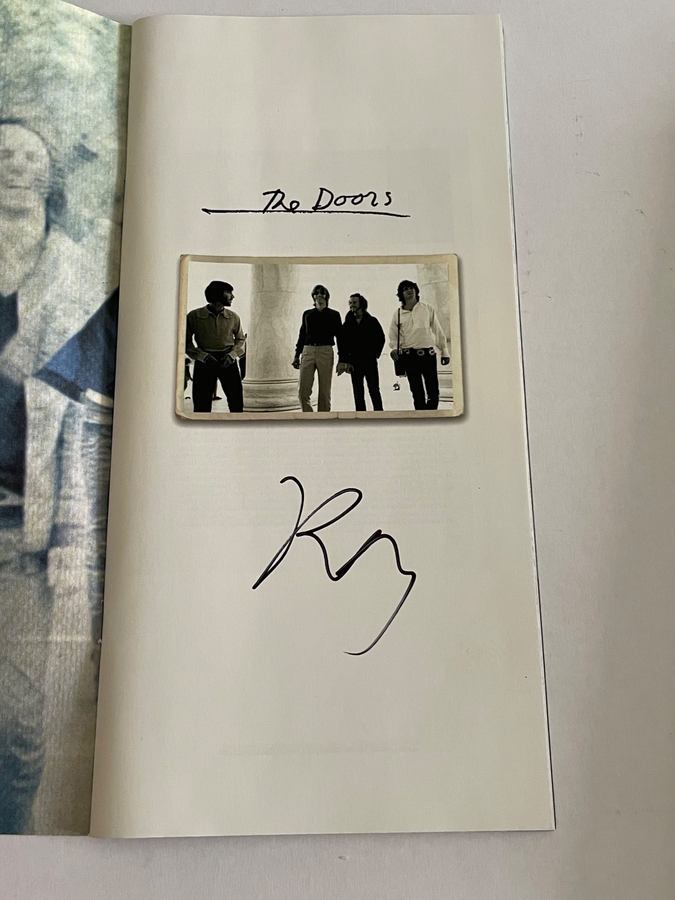 The Doors Box set. Signed on booklet by Ray Manzarek. Signed on rear of “The future ain’t what it used to be” cd by Ray Manzarek and also to rear of another cd by Ray Manzarek (Smudged)