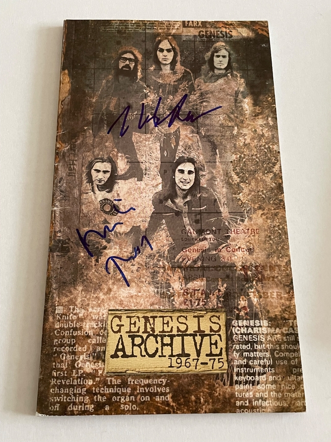 Genesis Archive CD box set. Booklet signed by Mike Rutherford and Steve Hackett