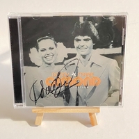 Donny and Marie Osmond - The Collection CD. Signed by Marie Osmond