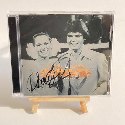 Donny and Marie Osmond - The Collection CD. Signed by Marie Osmond