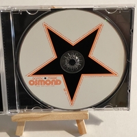 Donny and Marie Osmond - The Collection CD. Signed by Marie Osmond