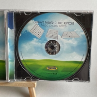 Graham Parker and The Rumour - Three Chords Good CD. Believed to be signed on front cover by Andrew Bodnar, Graham Parker and Martin Belmont. Signed on back of booklet by Bob Andrews