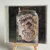 Stephen Stills - Illegal Stills CD. Signed by Stephen Stills