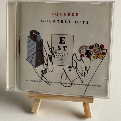 Squeeze - Greatest Hits CD. Signed on front by Paul Carrack, Jools Holland. On the rear, Chris Difford? Plus possibly one other