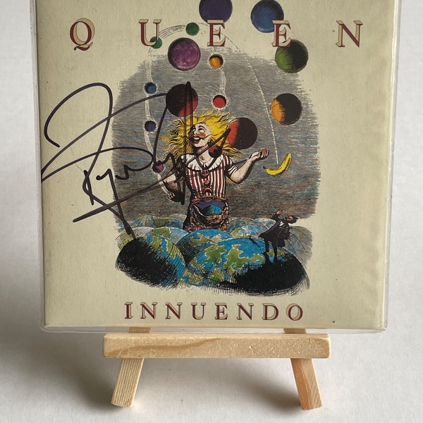 Queen - Innuendo CD signed by Roger Taylor and Bryan May in silver on the rear