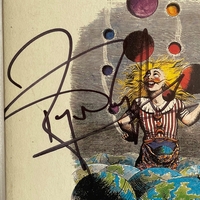 Queen - Innuendo CD signed by Roger Taylor and Bryan May in silver on the rear