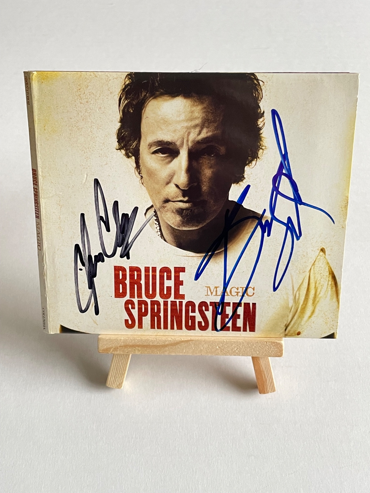 Bruce Springsteen - Magic CD. Signed on front cover by Bruce Springsteen and Clarence Clemons (deceased). Garry Tallent on back page