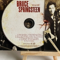 Bruce Springsteen - Magic CD. Signed on front cover by Bruce Springsteen and Clarence Clemons (deceased). Garry Tallent on back page