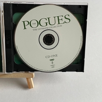 The Pogues - The Ultimate Collection CD. Signed by Spider and Philip Chevron