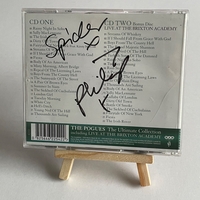 The Pogues - The Ultimate Collection CD. Signed by Spider and Philip Chevron