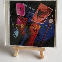 Foreigner - The Very Best and beyond. Signed by Mick Jones