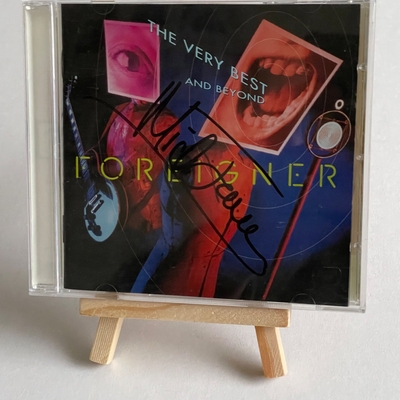 Foreigner - The Very Best and beyond. Signed by Mick Jones