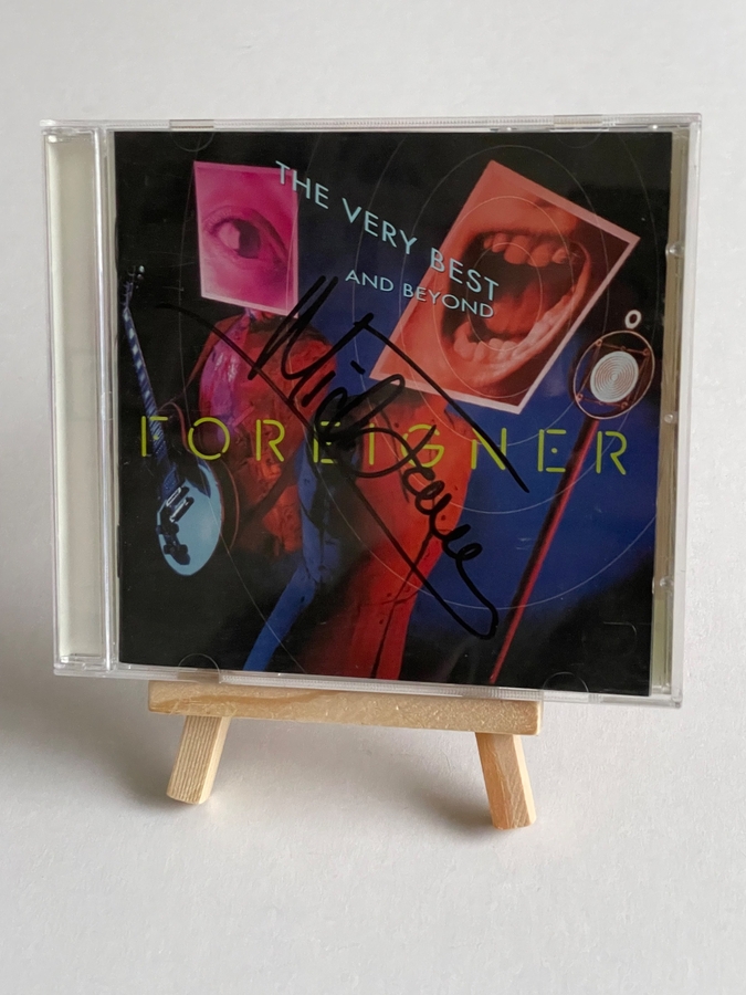 Foreigner - The Very Best and beyond. Signed by Mick Jones