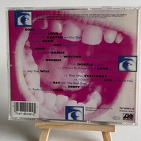 Foreigner - The Very Best and beyond. Signed by Mick Jones