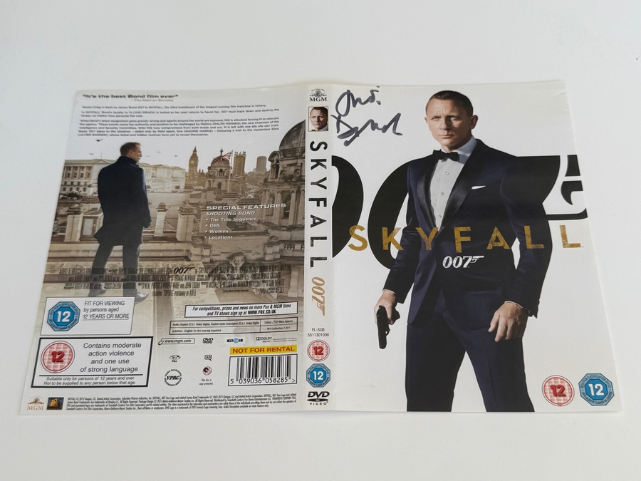 Skyfall DVD cover signed by Judi Dench. DVD sleeve only