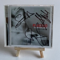 Placebo - Once More With Feeling CD. Signed by Brian Molko, Stefan Olsdal and one other unknown