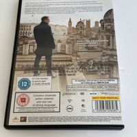 Skyfall DVD cover signed by Judi Dench.