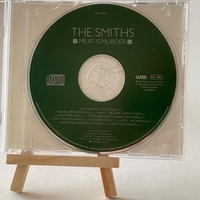 The Smiths - Meat is Murder CD. Signed by Andy Rourke and Mike Joyce