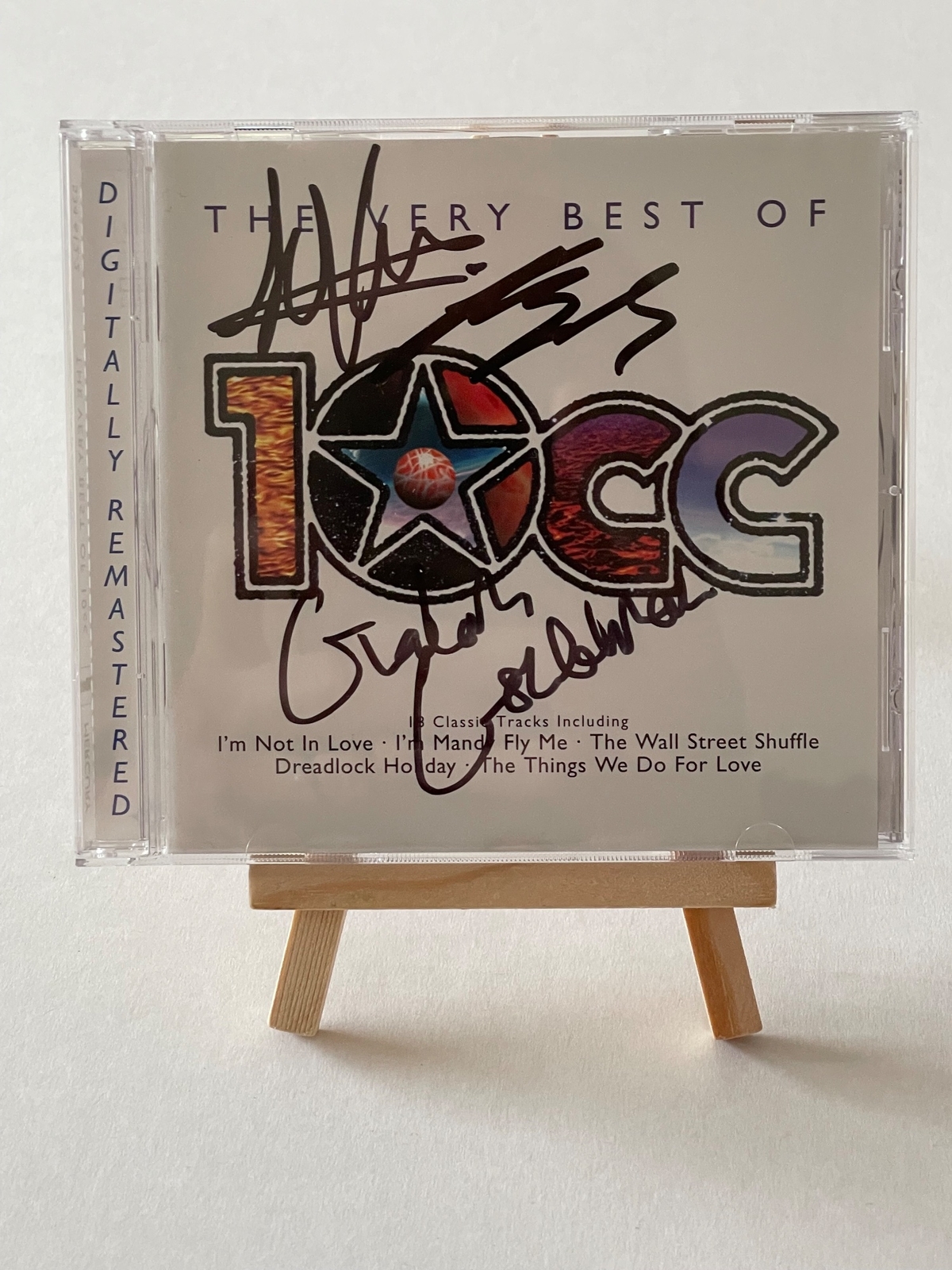 10CC - The very best of CD. Signed by Graham Gouldman, Kevin Godley and Lol Creme