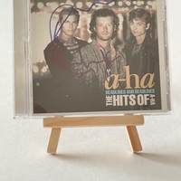 A-HA - Headlines and Deadlines CD. Signed by Morton Harket, Magne Furuholmen, Paul Waaktaar-Savoy