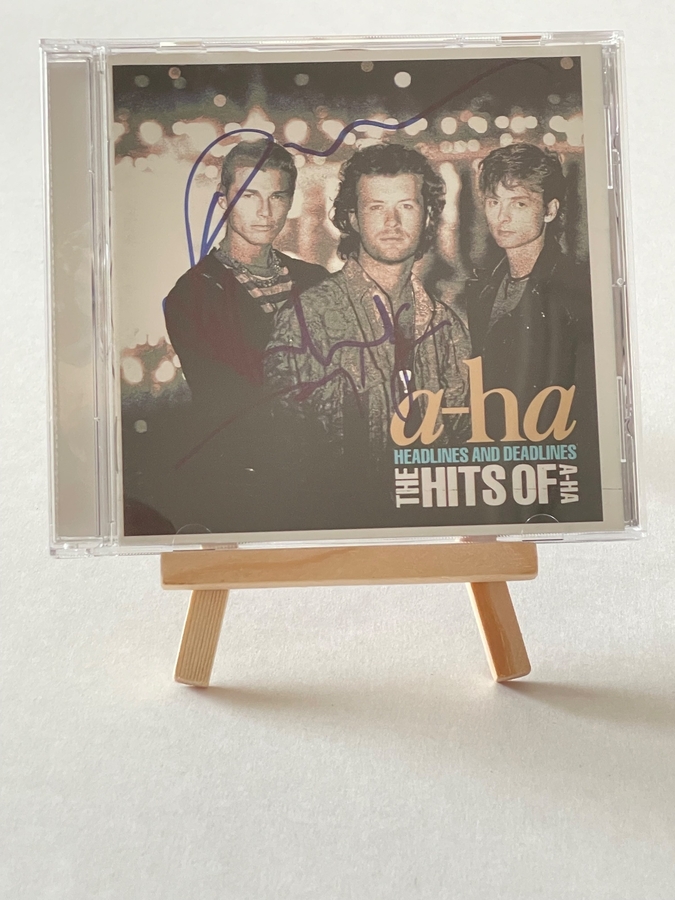 A-HA - Headlines and Deadlines CD. Signed by Morton Harket, Magne Furuholmen, Paul Waaktaar-Savoy