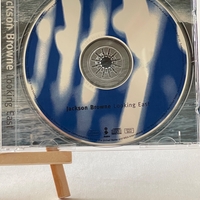 Jackson Browne - Looking East CD. Signed by Jackson Brown and Fritz Lewak