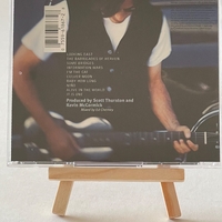 Jackson Browne - Looking East CD. Signed by Jackson Brown and Fritz Lewak