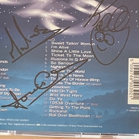 Electric Light Orchestra - Light Years. Signed on front of book cover by: Bev Bevan. Signed on rear page by: Kelly Groucutt, Louis Clark and Mik Kaminski