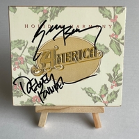 America - Holiday Harmony CD. Signed by Dewey Bunnell and Gerry Beckley