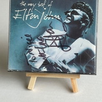 Elton John - The Very Best of CD. Signed by Elton John, personalised to Nigel